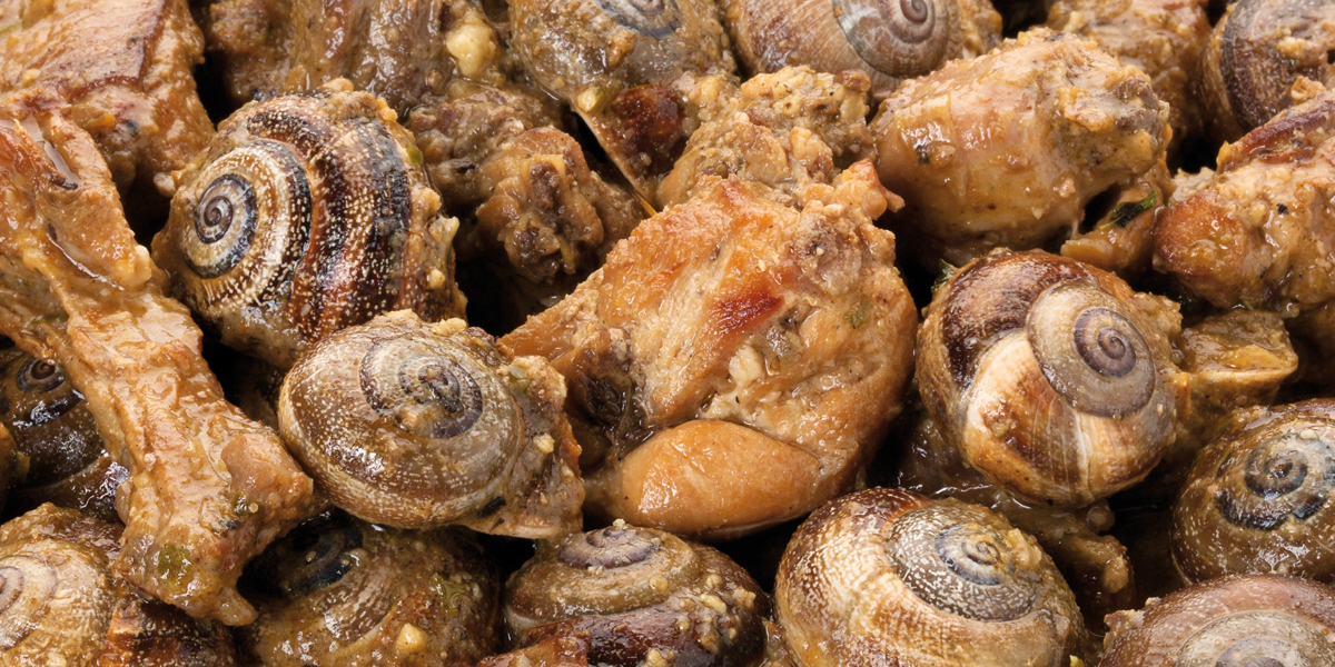 Conill rostit amb cargols de vinya